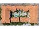 A drone shot of a courtyard with a pool, fountain, and patio in the center of buildings at 100 4Th S Ave # 312, St Petersburg, FL 33701