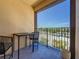 Cozy balcony area with outdoor seating and a view of the neighborhood at 100 4Th S Ave # 312, St Petersburg, FL 33701