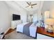 Spacious bedroom featuring natural light, and an en suite bathroom at 100 4Th S Ave # 312, St Petersburg, FL 33701