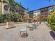 Beautiful courtyard featuring lounge chairs, mature landscaping, and seating at 100 4Th S Ave # 312, St Petersburg, FL 33701
