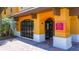 A welcoming entrance with signage, a glass door, and covered access at 100 4Th S Ave # 312, St Petersburg, FL 33701