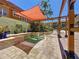 Community hot tub featuring privacy trellis and mature plantings at 100 4Th S Ave # 312, St Petersburg, FL 33701