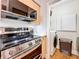 Well-equipped kitchen features stainless steel appliances and a laundry area at 100 4Th S Ave # 312, St Petersburg, FL 33701