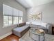 Living room with large windows, providing views and ample natural light at 100 4Th S Ave # 312, St Petersburg, FL 33701