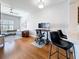 Living room with office nook features hardwood floors and a view of the kitchen at 100 4Th S Ave # 312, St Petersburg, FL 33701