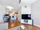 View of the living room flowing into the kitchen area with barstool seating at 100 4Th S Ave # 312, St Petersburg, FL 33701