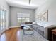 Inviting living room with hardwood floors and large windows at 100 4Th S Ave # 312, St Petersburg, FL 33701