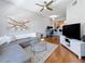 Open-concept living room seamlessly connects to the kitchen and bar area at 100 4Th S Ave # 312, St Petersburg, FL 33701