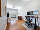 Bright living room with hardwood floors, open layout and adjacent office space at 100 4Th S Ave # 312, St Petersburg, FL 33701