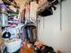 A practical walk-in closet with multiple racks, shelves and hardwood flooring for clothing and storage at 100 4Th S Ave # 312, St Petersburg, FL 33701