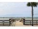 Community waterfront dock with benches and Intracoastal views at 100 Bluff View Dr # 308A, Belleair Bluffs, FL 33770