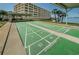 Waterfront shuffleboard courts offer a great way to enjoy the outdoors with views of the beautiful waterfront and grounds at 100 Bluff View Dr # 308A, Belleair Bluffs, FL 33770
