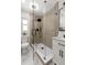 Updated bathroom showcasing a glass-enclosed shower with modern fixtures and a stylish vanity at 109 13Th St, Belleair Beach, FL 33786