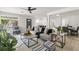 Spacious living room with open floor plan, leading into the dining and kitchen areas at 109 13Th St, Belleair Beach, FL 33786