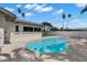 Inviting pool area features a pristine in-ground pool, patio, and privacy fence at 109 13Th St, Belleair Beach, FL 33786