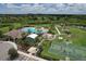 Community with large pool, playground, and a basketball court in lush, green landscape at 11336 Callaway Pond Dr, Riverview, FL 33579