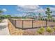 Fenced community playground featuring climbing structure and slide, providing a safe and fun environment for  at 11336 Callaway Pond Dr, Riverview, FL 33579