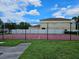 Community basketball court provides residents with recreational opportunities for active outdoor fun at 12121 Tree Haven Ave, Gibsonton, FL 33534