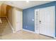 Entryway featuring tile flooring, staircase, neutral paint, and decorative door accents at 12121 Tree Haven Ave, Gibsonton, FL 33534