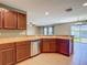 Open kitchen area featuring ample counter space and stainless steel dishwasher at 12121 Tree Haven Ave, Gibsonton, FL 33534