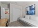 Bedroom showcases a daybed with stylish accents and closet doors for ample storage at 12277 Spring Hill Dr, Spring Hill, FL 34609