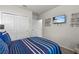Inviting bedroom featuring a bed, modern decor, and a comfortable atmosphere for relaxation at 12277 Spring Hill Dr, Spring Hill, FL 34609