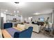 Open-concept living area with seamless flow to the modern kitchen and dining space, ideal for entertaining at 12277 Spring Hill Dr, Spring Hill, FL 34609