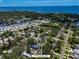 Panoramic aerial view of a neighborhood, showcasing the property's proximity to the water at 132 Pennsylvania Ave, Palm Harbor, FL 34683