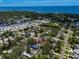 Aerial view showcasing the property's location near waterfront and surrounding neighborhood at 132 Pennsylvania Ave, Palm Harbor, FL 34683