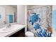 Cozy bathroom with vanity and decorative turtle-themed shower curtain at 1332 Ocean Spray Dr, Ruskin, FL 33570