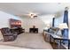 Comfortable living room with plush seating, media center, and plenty of natural light at 1332 Ocean Spray Dr, Ruskin, FL 33570