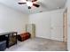 An office space featuring a ceiling fan, desk with cabinet, a filing cabinet and a storage chest at 1332 Ocean Spray Dr, Ruskin, FL 33570