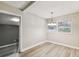 Bright dining area features updated floors and fixtures at 1510 W Powhatan Ave, Tampa, FL 33603