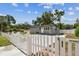 A home with a charming white picket fence enhances the curb appeal of this property at 1510 W Powhatan Ave, Tampa, FL 33603