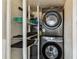 Laundry room featuring side by side washer and dryer and shelves at 1510 W Powhatan Ave, Tampa, FL 33603