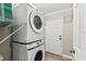 Convenient laundry area with white stacked washer and dryer at 1510 W Powhatan Ave, Tampa, FL 33603