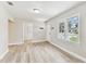 Light filled living room featuring neutral paint, modern floors and an inviting atmosphere at 1510 W Powhatan Ave, Tampa, FL 33603