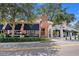 Charming street view showcasing local shops with awnings, offering a vibrant neighborhood atmosphere at 1731 W Watrous Ave # 202, Tampa, FL 33606