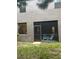 Enclosed patio area with seating at 17361 Old Tobacco Rd, Lutz, FL 33558