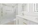Modern bathroom with a glass walk-in shower, and a sleek vanity with modern fixtures at 1901 76Th N Ave, St Petersburg, FL 33702