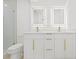 Contemporary bathroom featuring a double vanity, sleek fixtures, and a glass-enclosed shower at 1901 76Th N Ave, St Petersburg, FL 33702