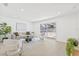 Inviting living room with contemporary furnishings and a sliding glass door to the pool area at 1901 76Th N Ave, St Petersburg, FL 33702