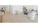 Open-concept living room with ample natural light, stylish furniture and decorative accents at 1901 76Th N Ave, St Petersburg, FL 33702