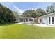 A meticulously maintained backyard and patio, ideal for relaxation and entertaining at 211 60Th S Ave, St Petersburg, FL 33705