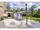 Backyard features a concrete patio and pergola, perfect for outdoor entertaining at 211 60Th S Ave, St Petersburg, FL 33705