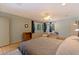 Bedroom with parquet flooring, ceiling fan and large windows allowing ample natural light at 211 60Th S Ave, St Petersburg, FL 33705