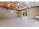 Unfinished garage with natural light, ideal for storage and DIY projects at 211 60Th S Ave, St Petersburg, FL 33705