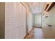 Hallway with storage closets and glass block window at 211 60Th S Ave, St Petersburg, FL 33705