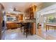 Well-appointed kitchen with stainless steel appliances, custom cabinets, and a breakfast bar at 211 60Th S Ave, St Petersburg, FL 33705