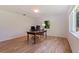 Office with hardwood flooring and bright window at 211 60Th S Ave, St Petersburg, FL 33705